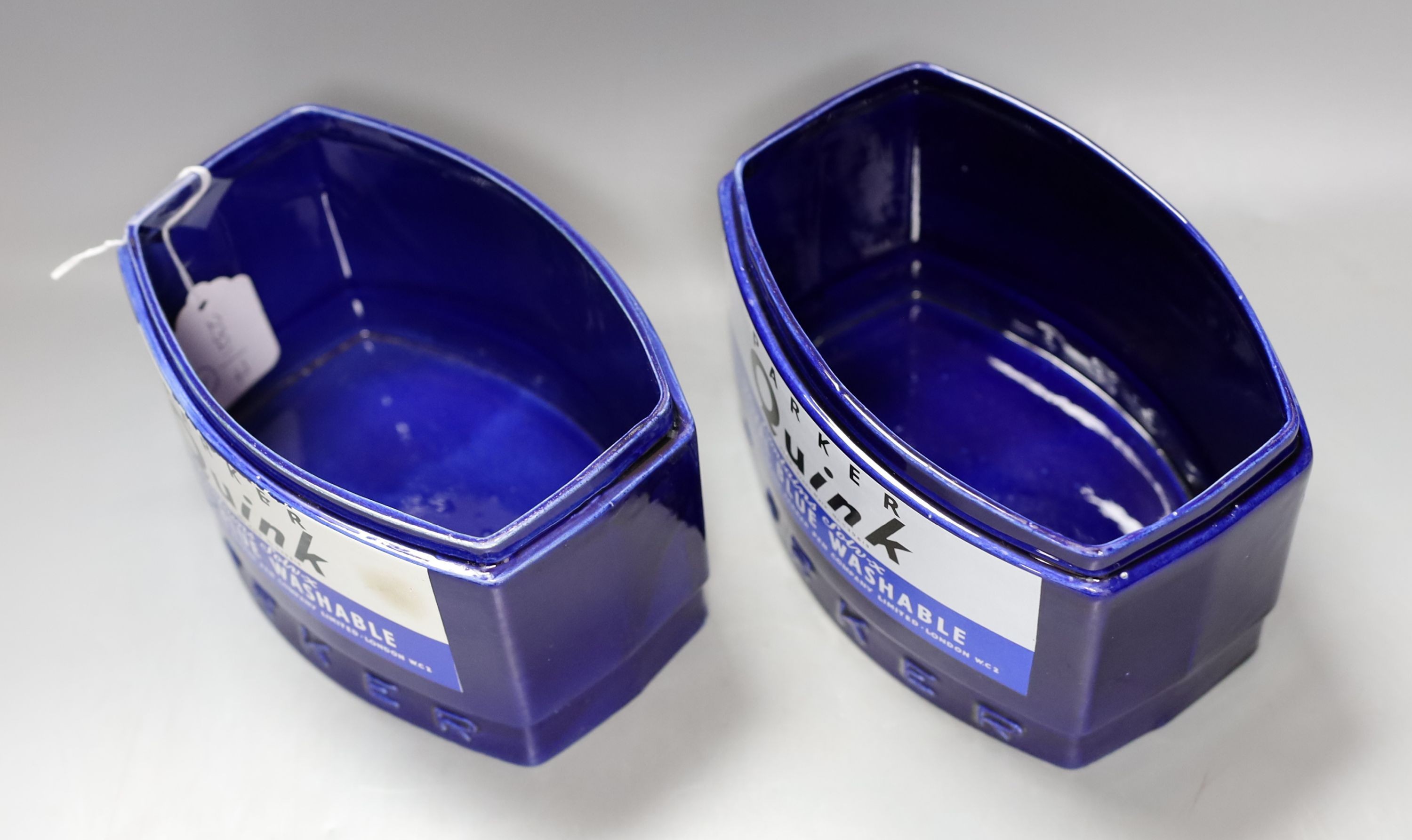 Four large display ceramic Royal Blue Parker Quink ink bottles, largest 20 cms high.